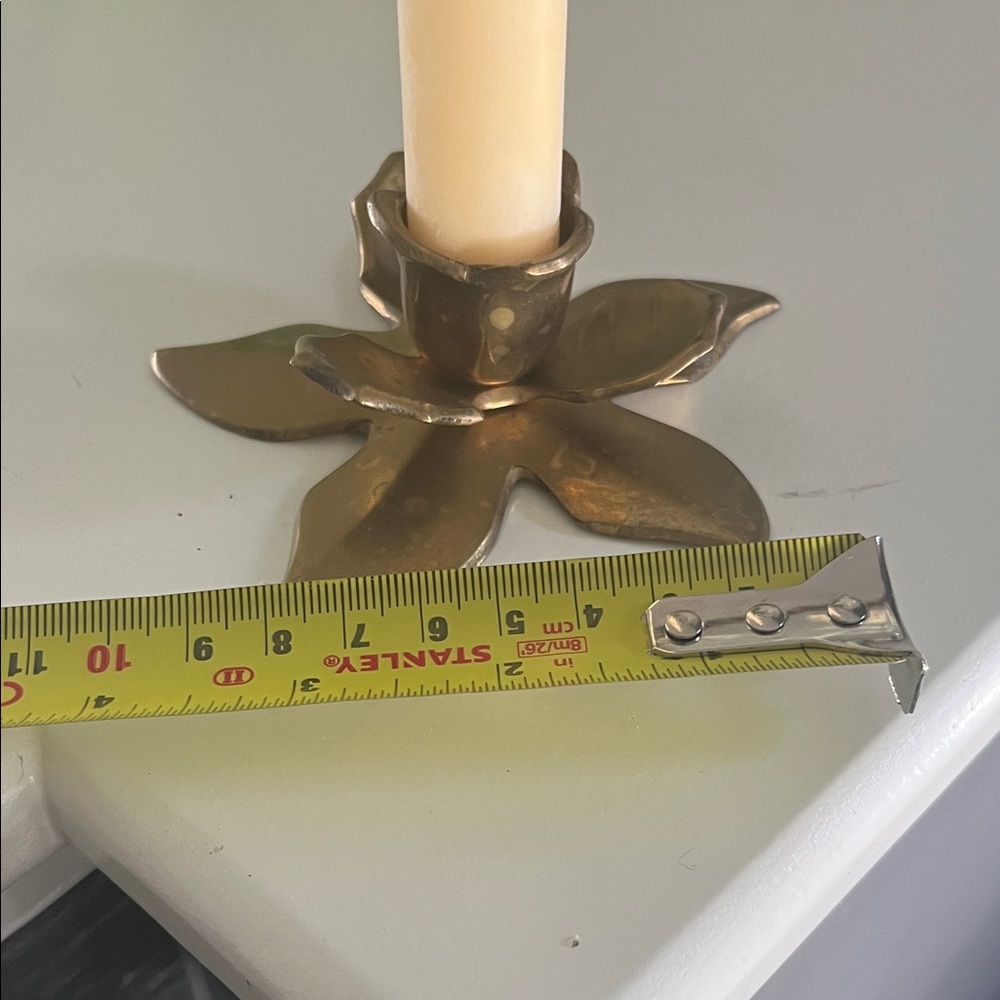 Vintage brass flower shaped candle holder
